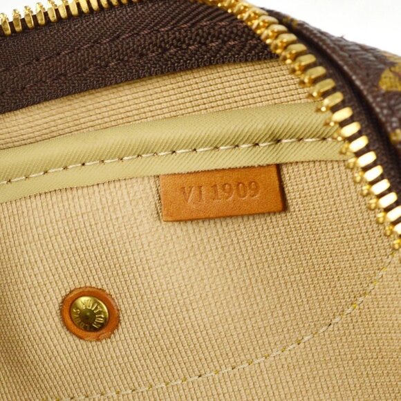 Louis Vuitton Monogram Evasion Travel Bag - Picture 7 of 10